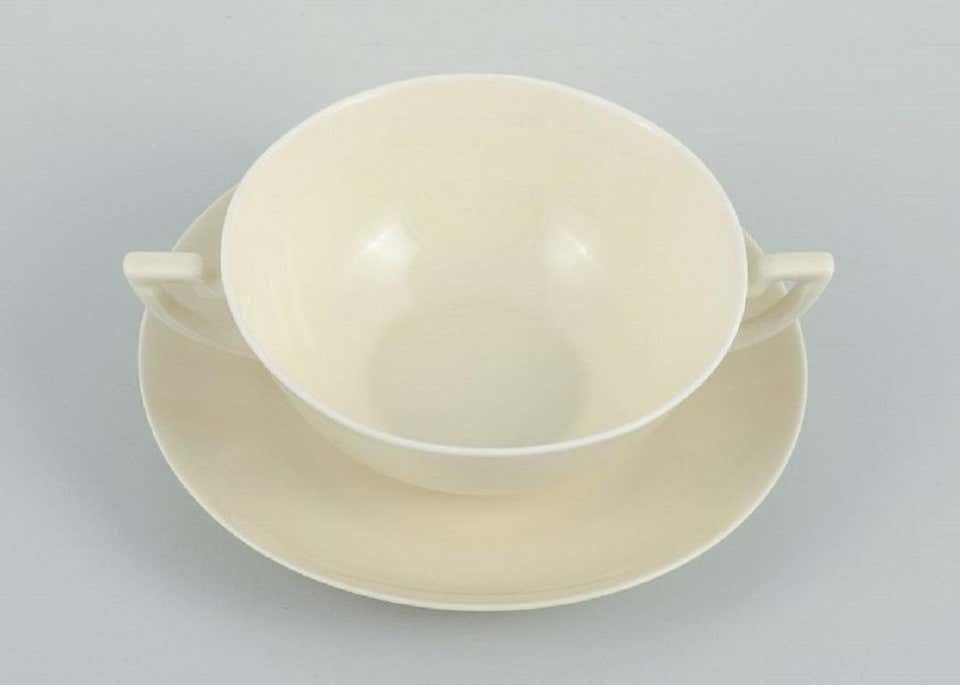 Nine Pairs Of Royal Copenhagen Cream Coloured Bouillon Cups With Saucers photo Home Decor