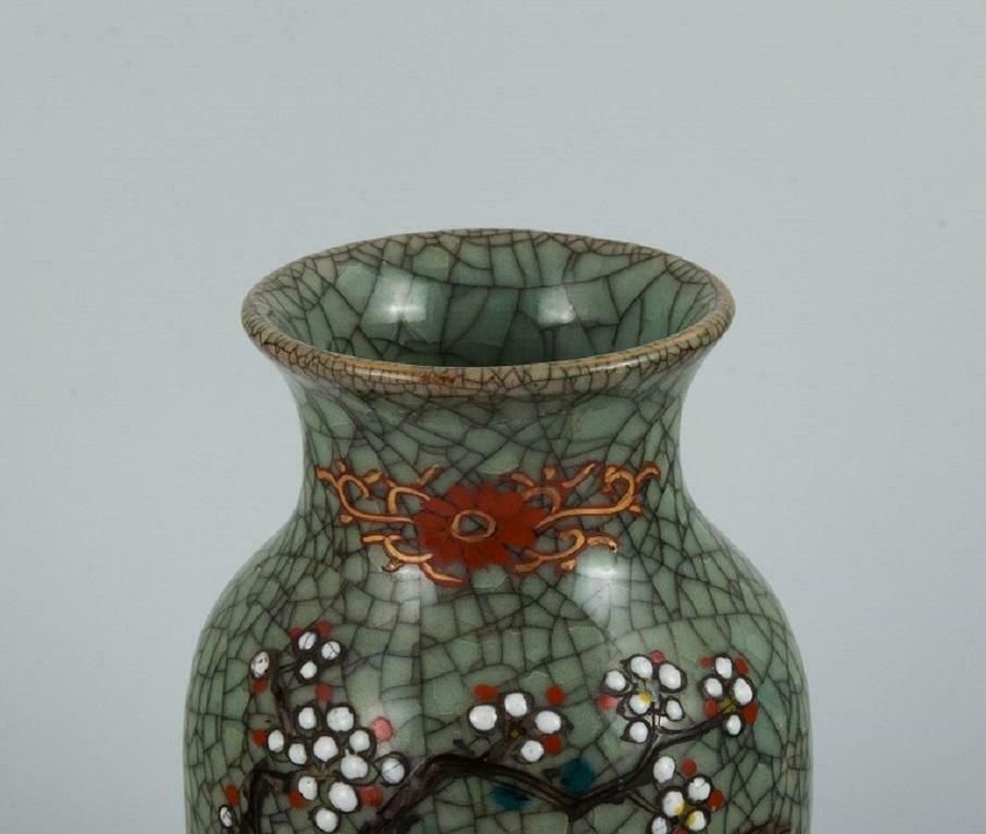 Asian Ceramic Vase Hand Painted With Classic Floral Motif photo for sale