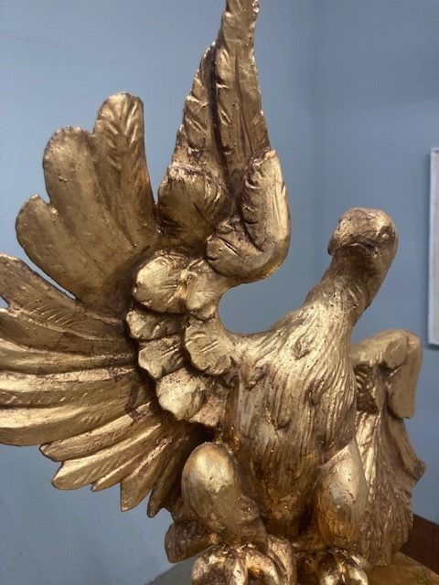 Ancient Eagle Sculpture In Gilded Wood From The 1600s On A Marbled Base photo buy