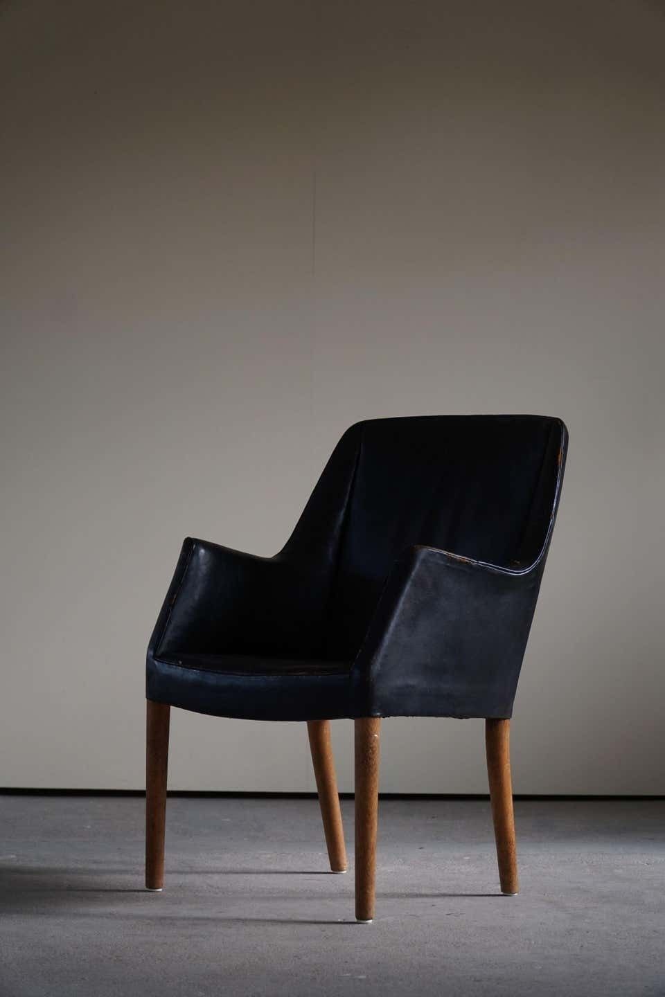 photo furniture Danish Modern Armchair By Nanna Ditzel In Oak And Patinated Leather, 1950s