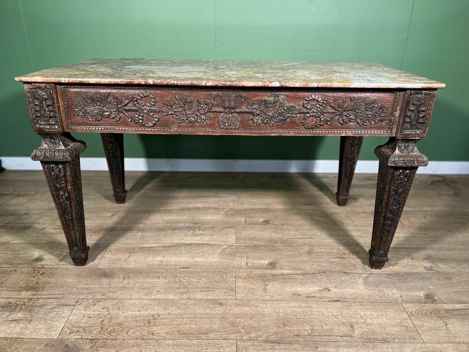 An Italian Carved Fruitwood Centre Table