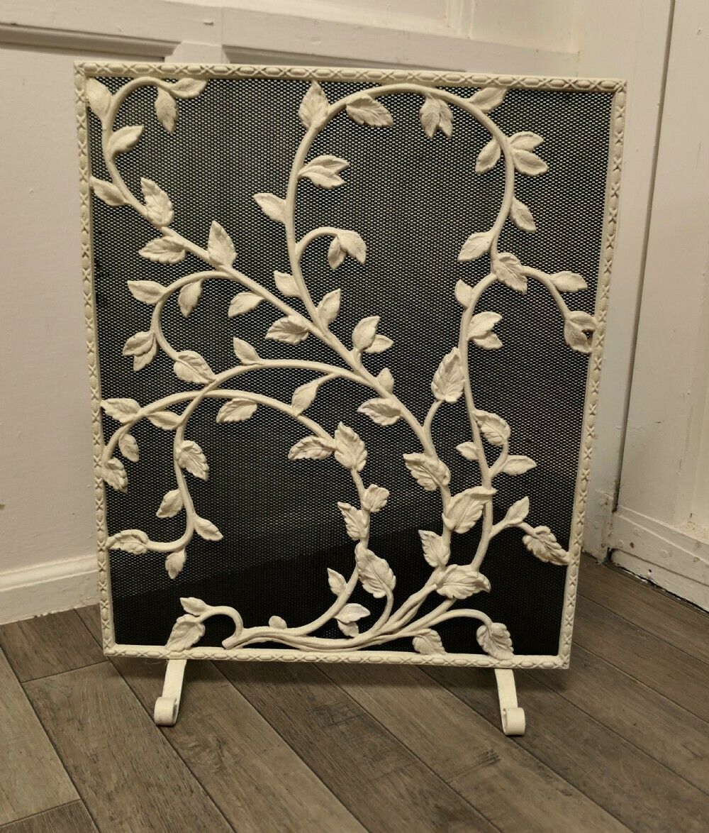 Painted Wrought Iron Fire Guard Decorated With Leaves photo furniture