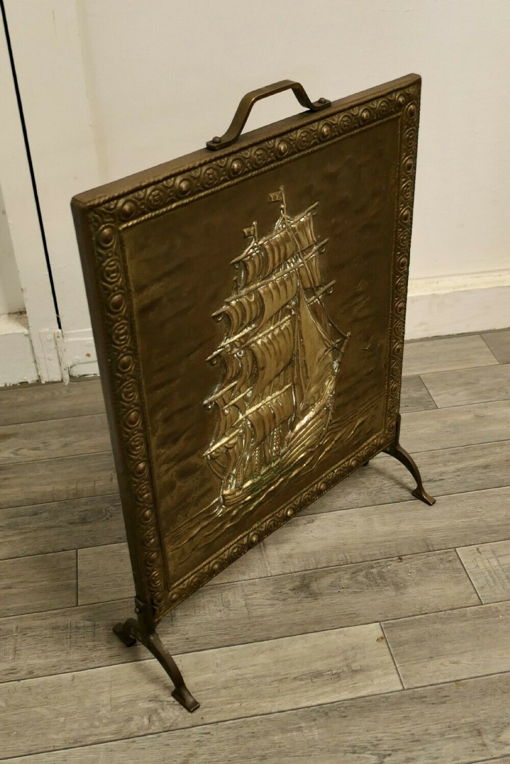 A Large Brass Fire Screen With The Cutty Sark photo for sale