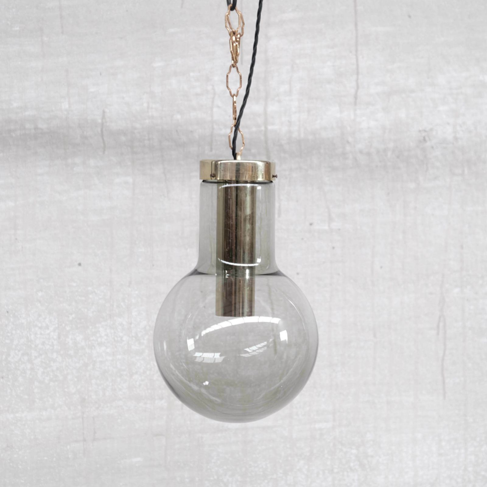 Large Smoked Mid Century Glass And Brass Pendant Lights By Raak (2 Available) photo furniture