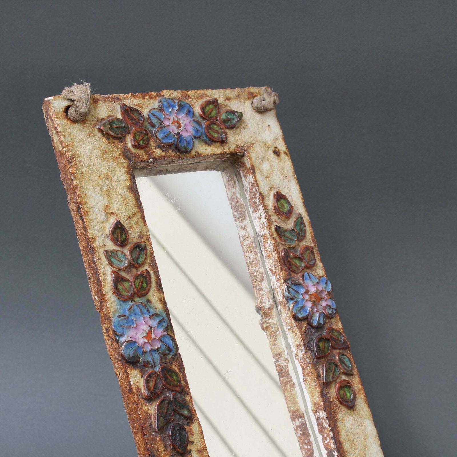 photo for sale Ceramic Wall Mirror With Flower Motif By La Roue (Circa 1960s)