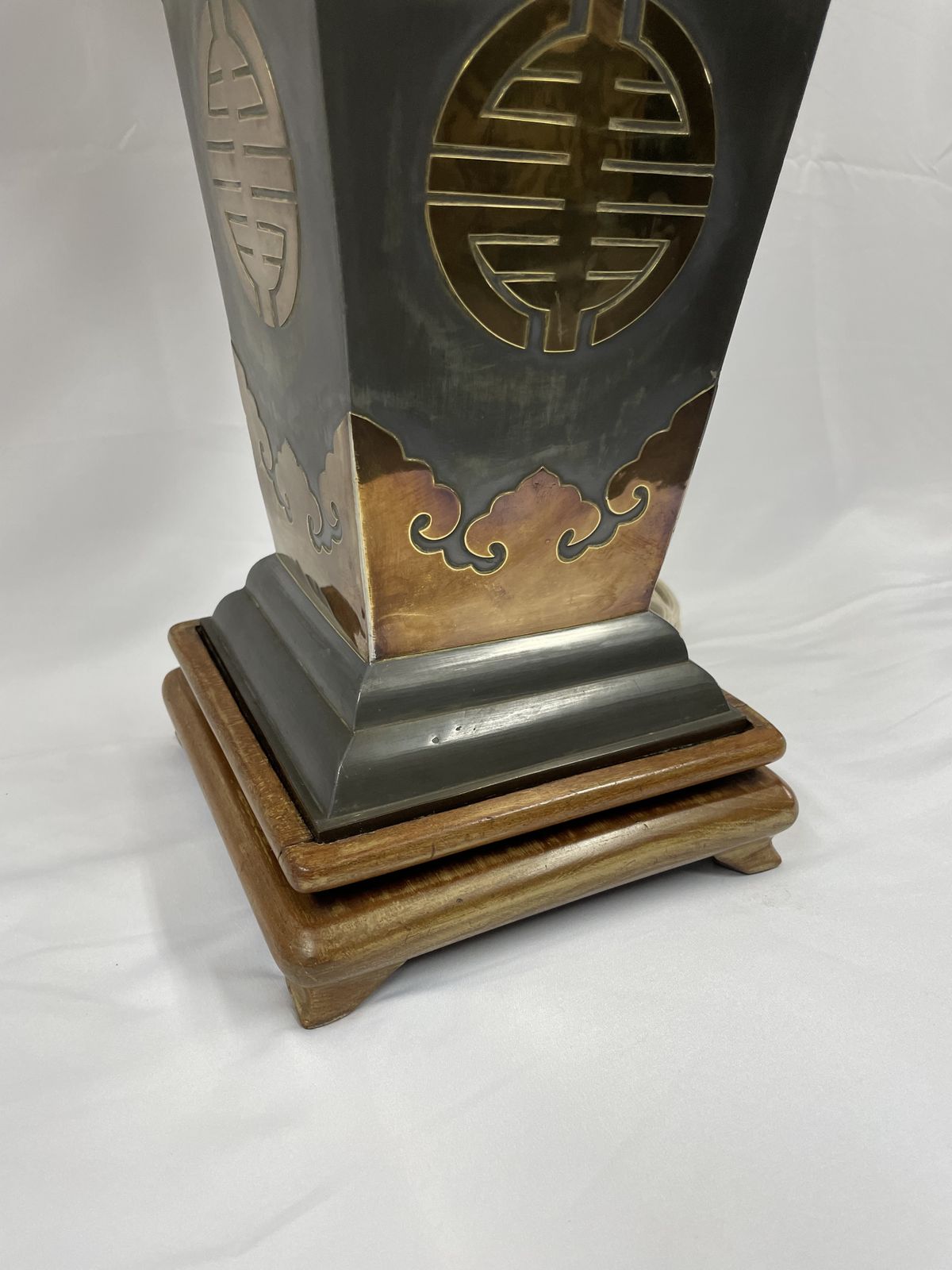 photo for sale Pair Of Metal Lamps With Brass Applications On Wooden Bases.  50's