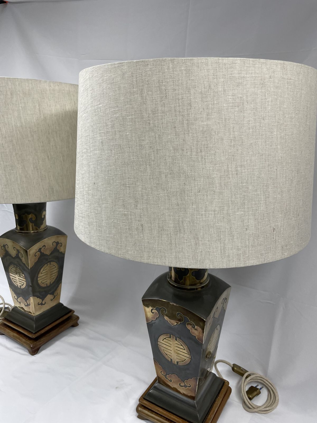 Lighting Pair Of Metal Lamps With Brass Applications On Wooden Bases.  50's photo