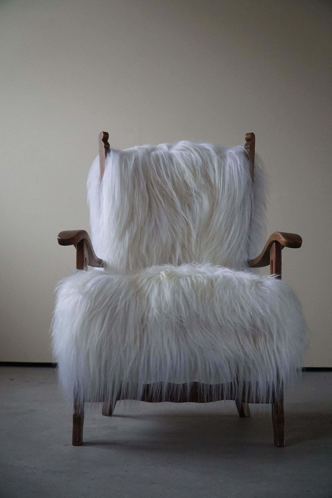 photo furniture Henning Kjærnulf, Armchair Reupholstered In Longhaired Icelandic Sheepskin, 1950