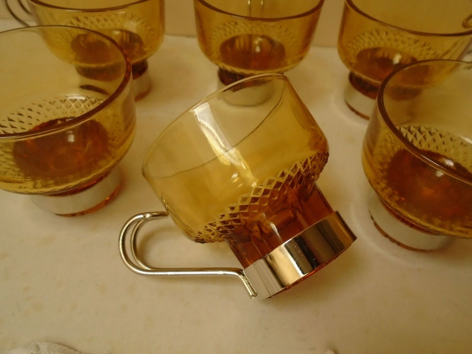 photo furniture Six Amber Glass Espresso Cups With Metal Handles, Faceted Gold Glass Coffee Cups, Stackable Coffee Cups, Made In Italy