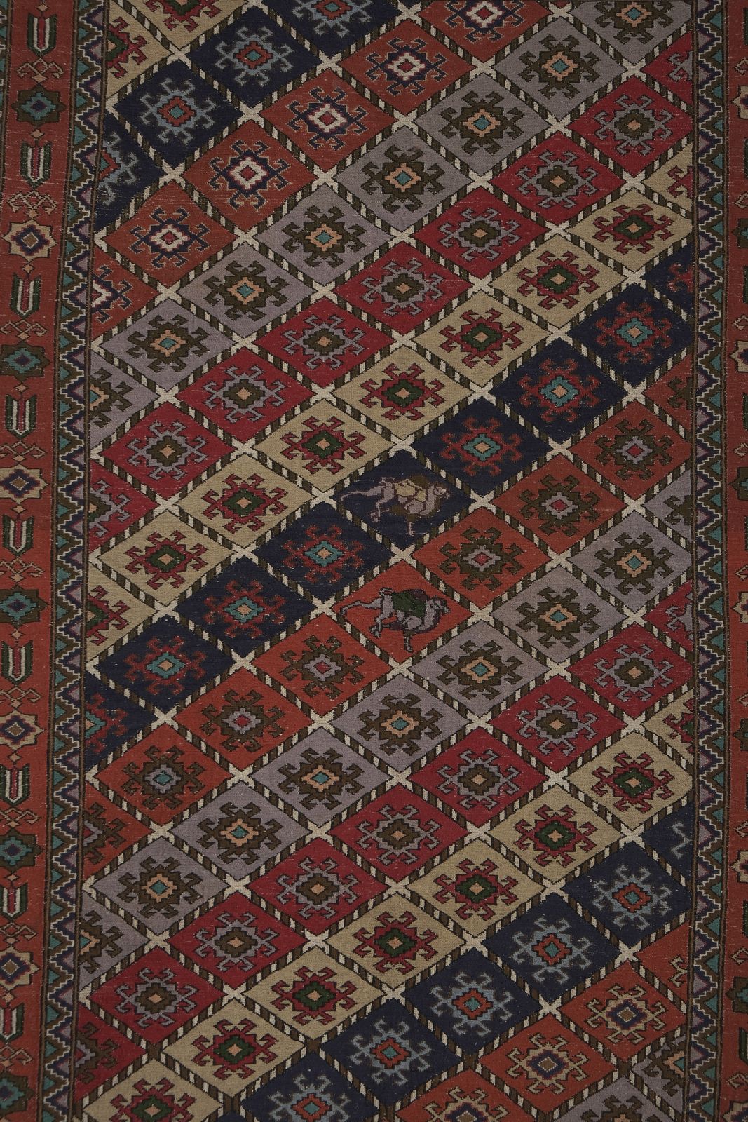 photo for sale 19th Century Tribal Animal Vintage Soumac Flat Weave Rug