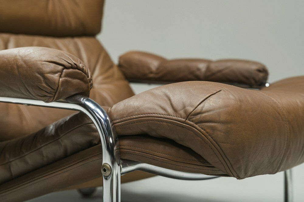 photo vintage Swedish Chrome & Brown Leather Lounge Chair And Footstool From Scapa Rydaholm, 1960s, Set Of 2