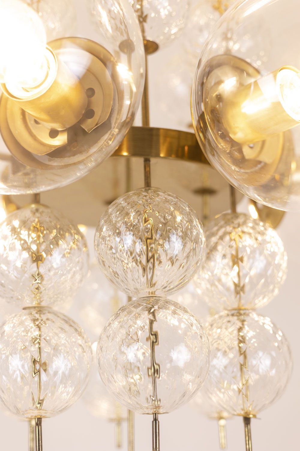 photo furniture Chandelier In Golden Brass And Blown Glass, 1970s