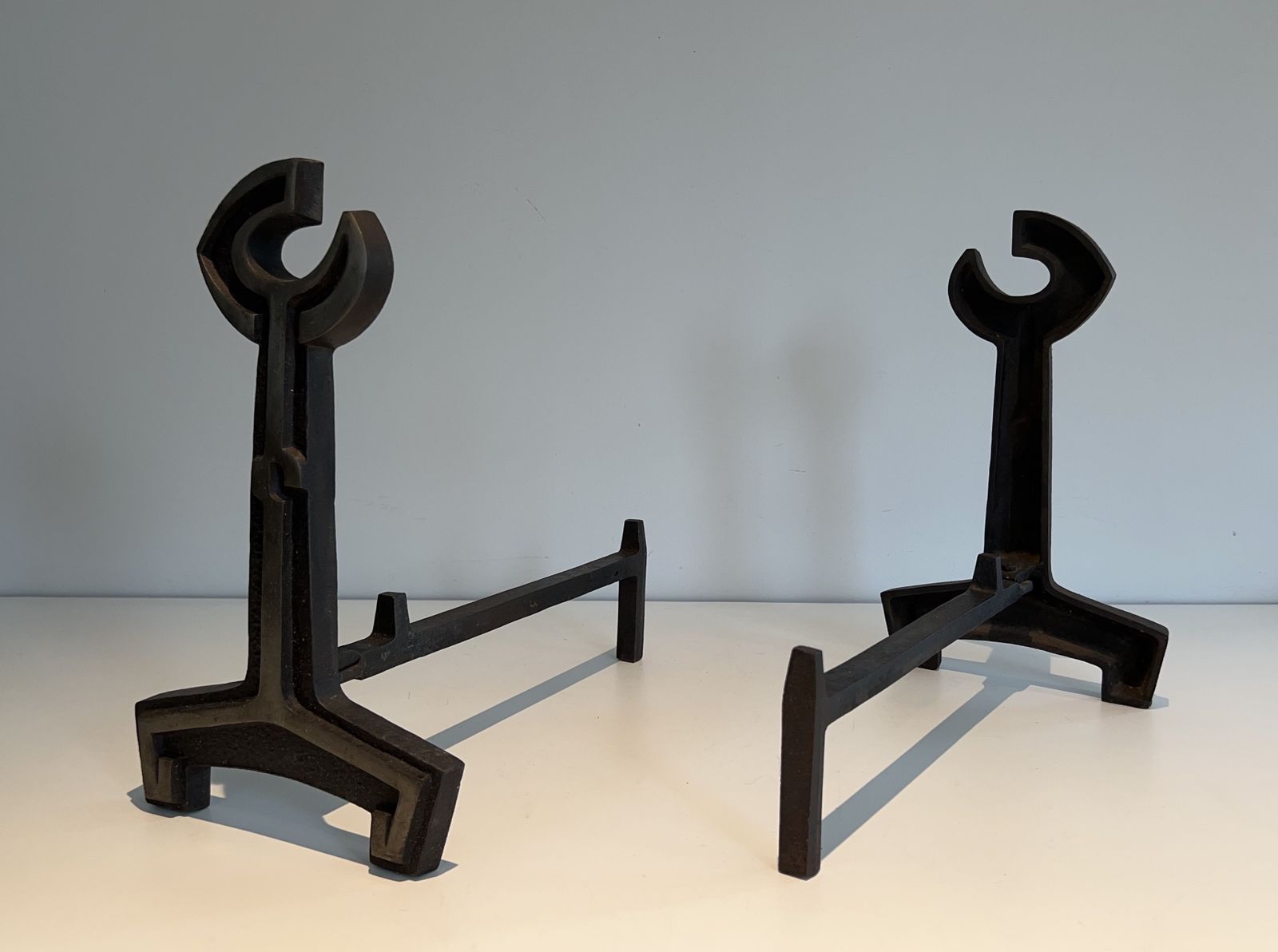 photo for sale Pair Of Modernist Cast Iron And Wrought Iron Andirons