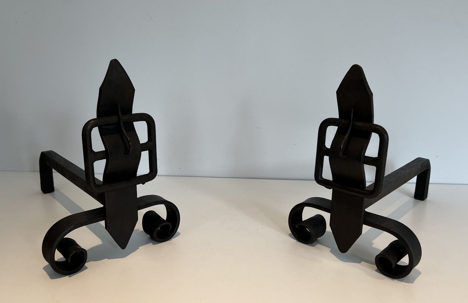 Pair Of Modernist Cast Iron And Wrought Iron Belt Andirons photo furniture