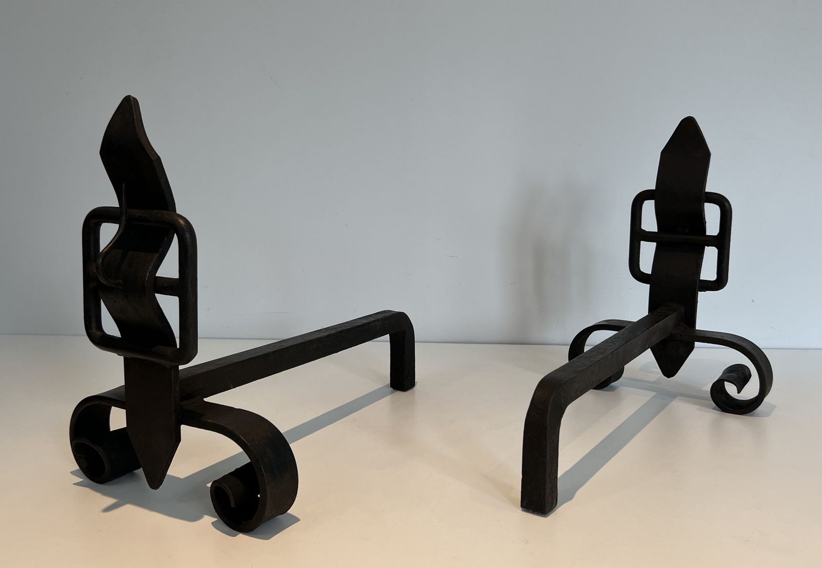 Pair Of Modernist Cast Iron And Wrought Iron Belt Andirons photo vinterior