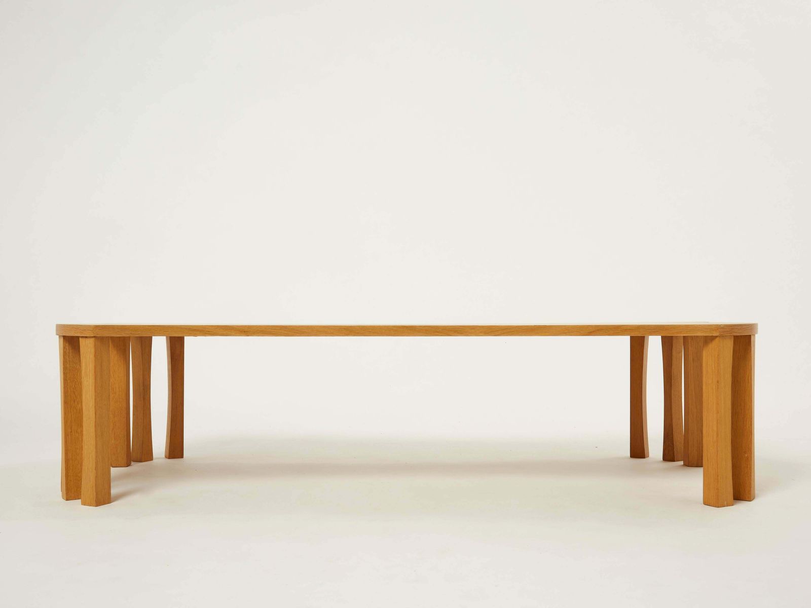 photo furniture Table basse Vincent Poujardieu en chêne massif, forme libre, 1992