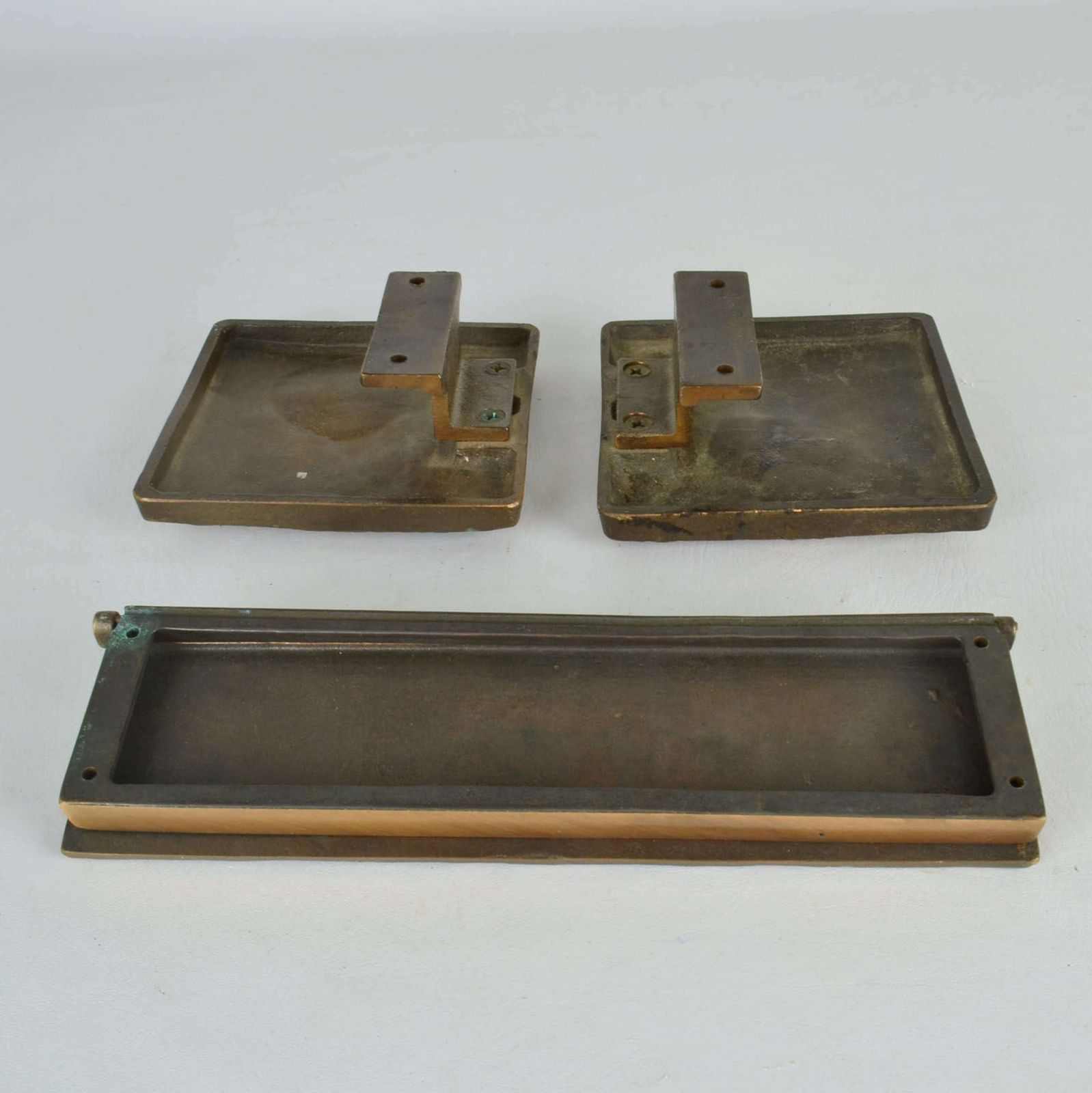 Three Push Pull Door Handles And Letterbox With Crater Relief photo Home Fixtures