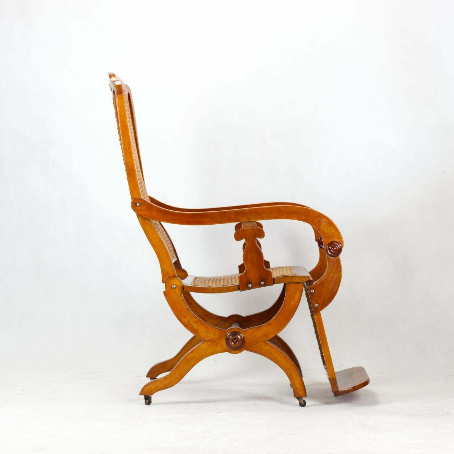 photo for sale 19th Century Biedermeier Reclining Cane Chair