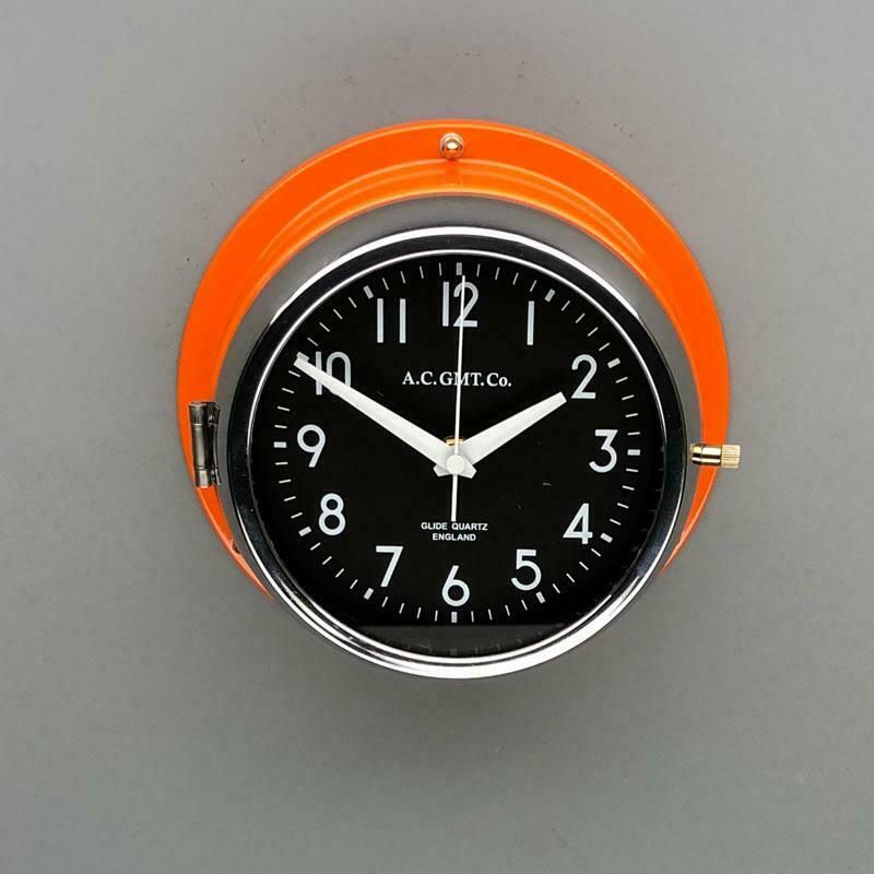 photo vinterior 1970s British Orange & Chrome Ac Gmt Co. Industrial Wall Clock Black Dial