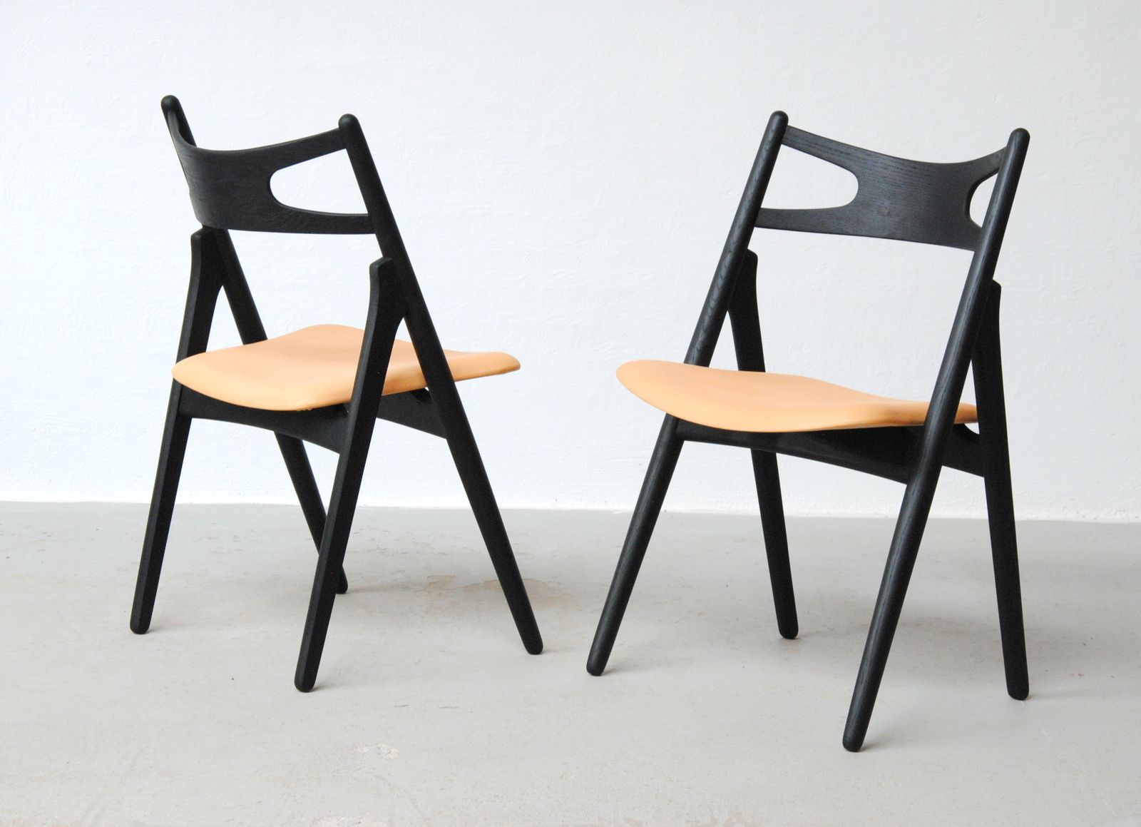 Set Of Two Fully Restored Danish Hans Wegner Sawbuck Chairs In Ebonized Oak 1950's