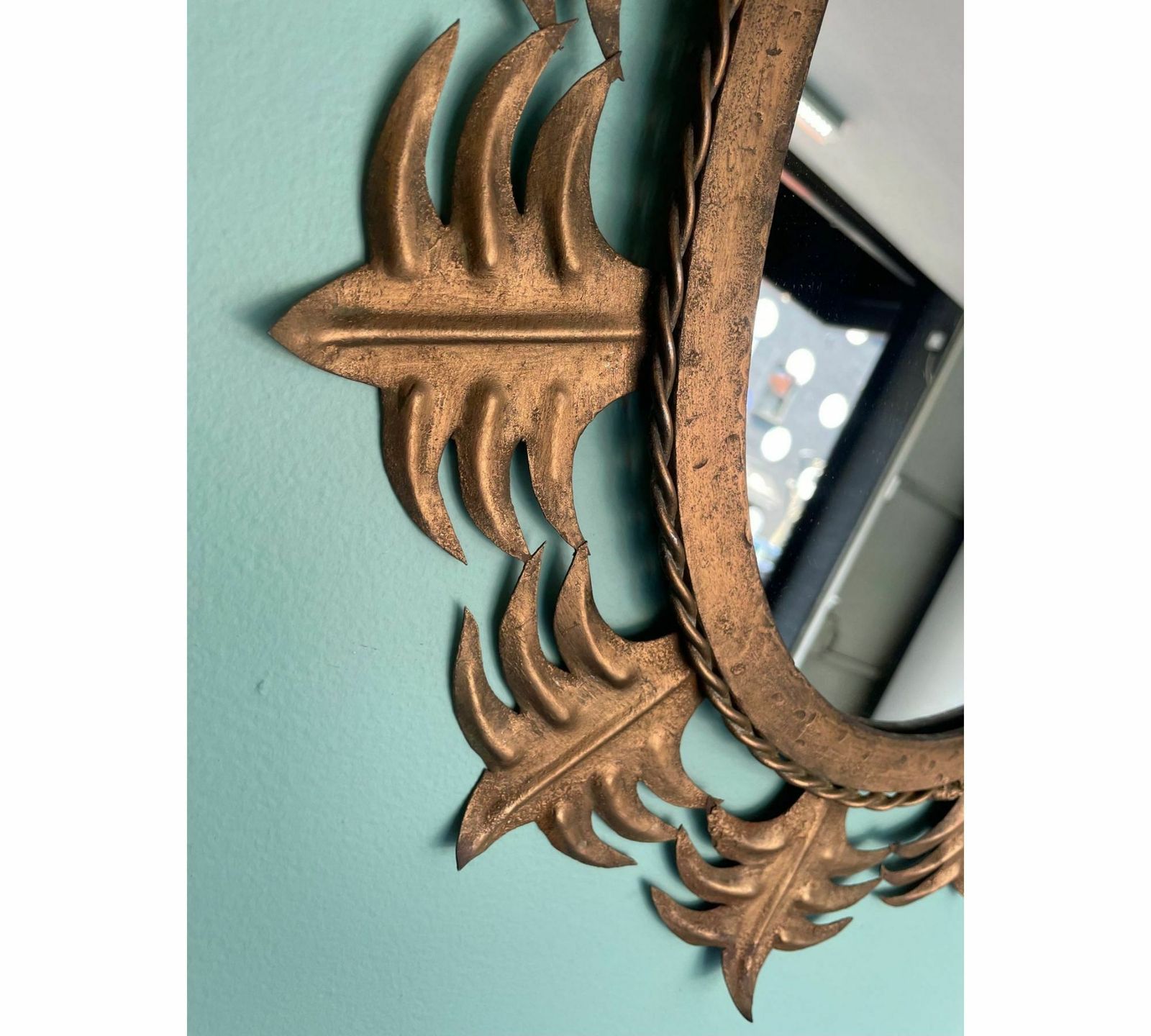 A Spanish Sunburst 1950s Gilt Metal Oval Mirror With Ornate Edging. photo buy
