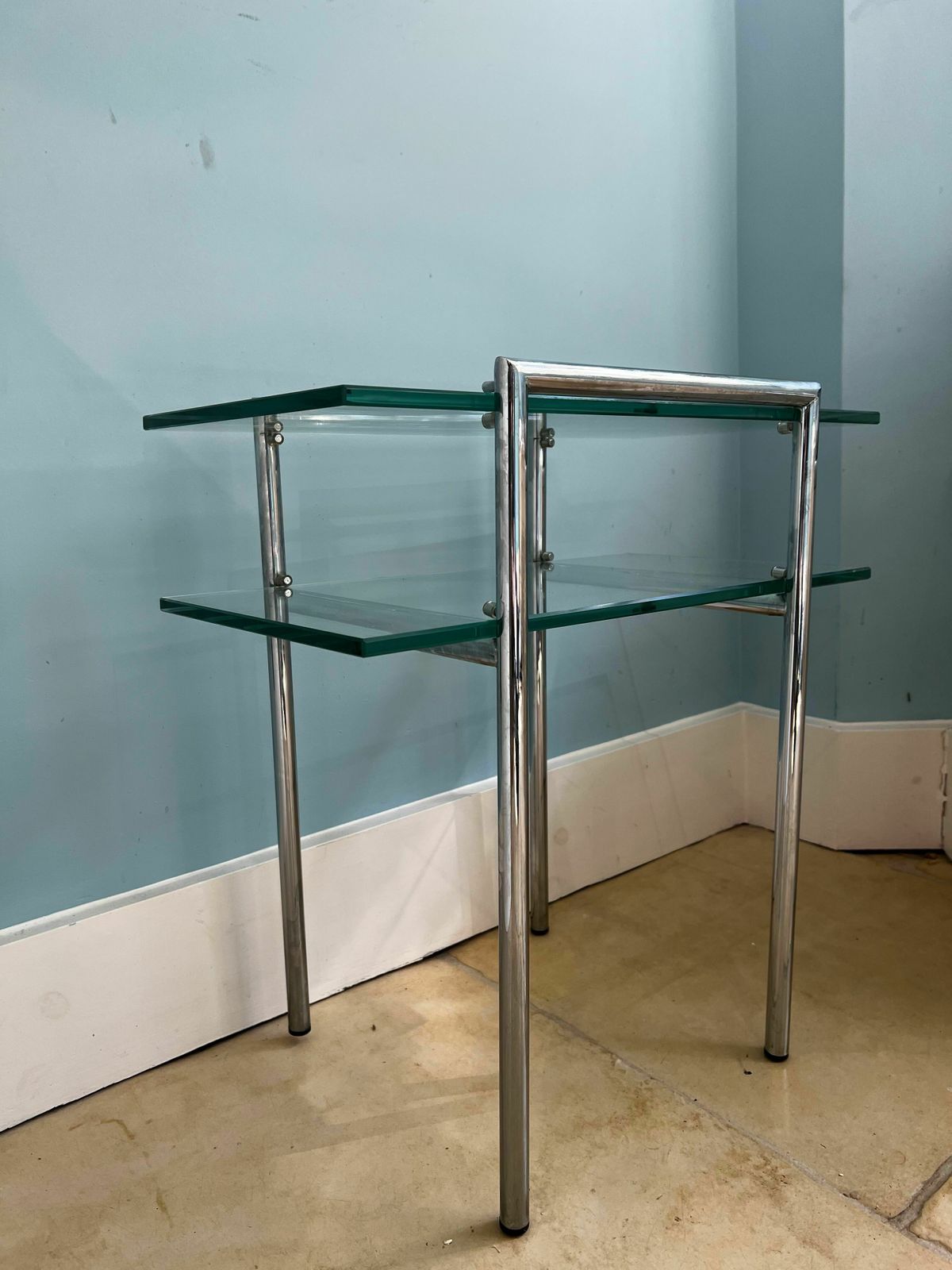 A Set Of Five Contemporary Glass And Chrome Tables. One Round Coffee Table, Four Side Tables Of Two Different Sizes. photo furniture