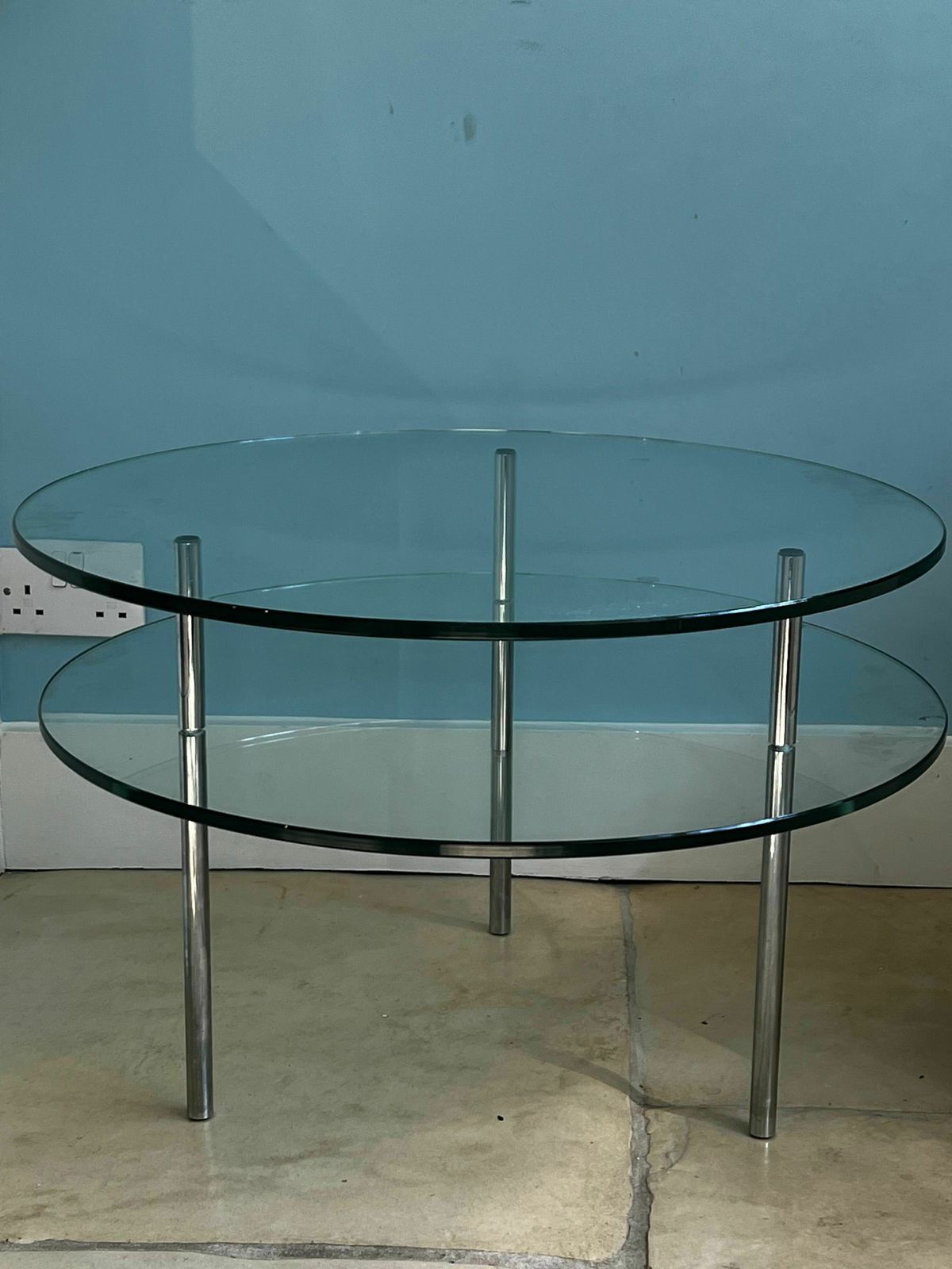 A Set Of Five Contemporary Glass And Chrome Tables. One Round Coffee Table, Four Side Tables Of Two Different Sizes.