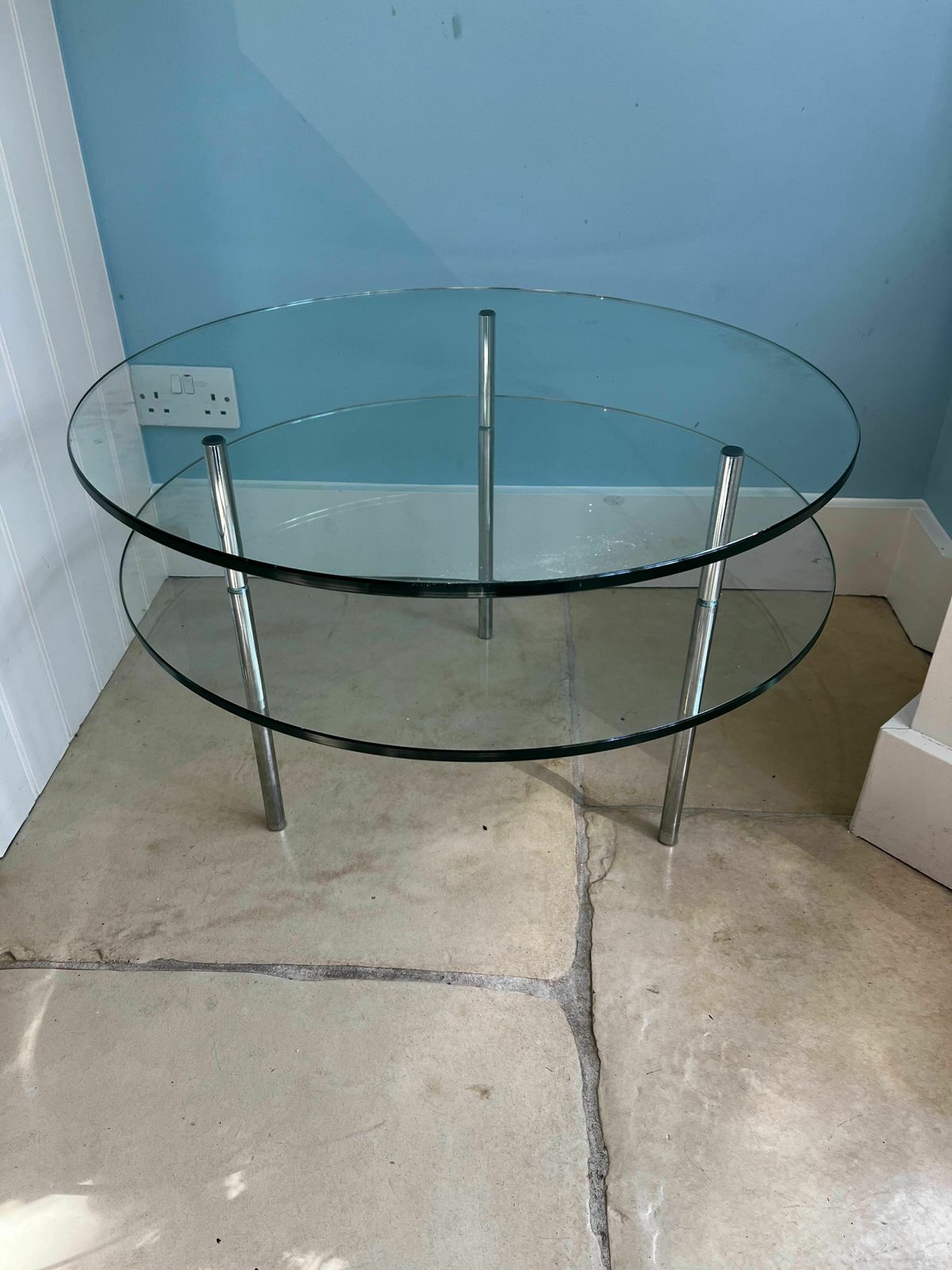 A Set Of Five Contemporary Glass And Chrome Tables. One Round Coffee Table, Four Side Tables Of Two Different Sizes. photo Furniture