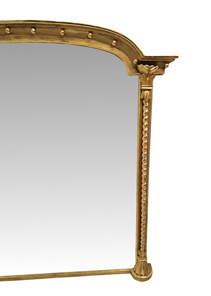 A Stunning 19th Century Giltwood Overmantle Mirror photo for sale