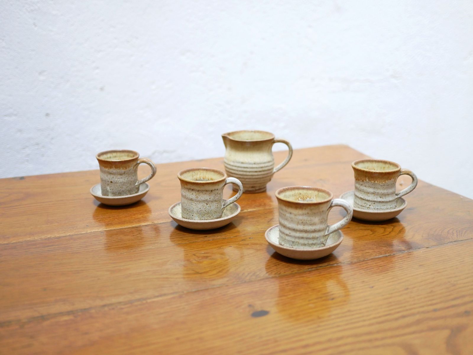 Series Of 4 Cups And A Vintage Sandstone Milk Jug photo 52.08