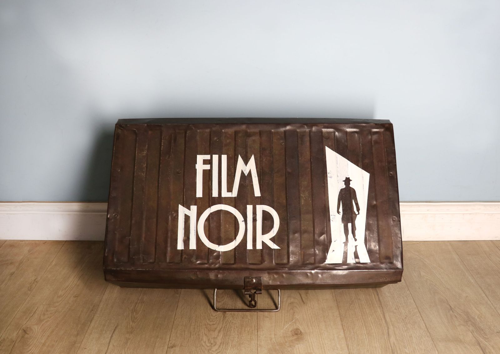 A Vintage Metal Trunk Later Sign Written For Film Noir