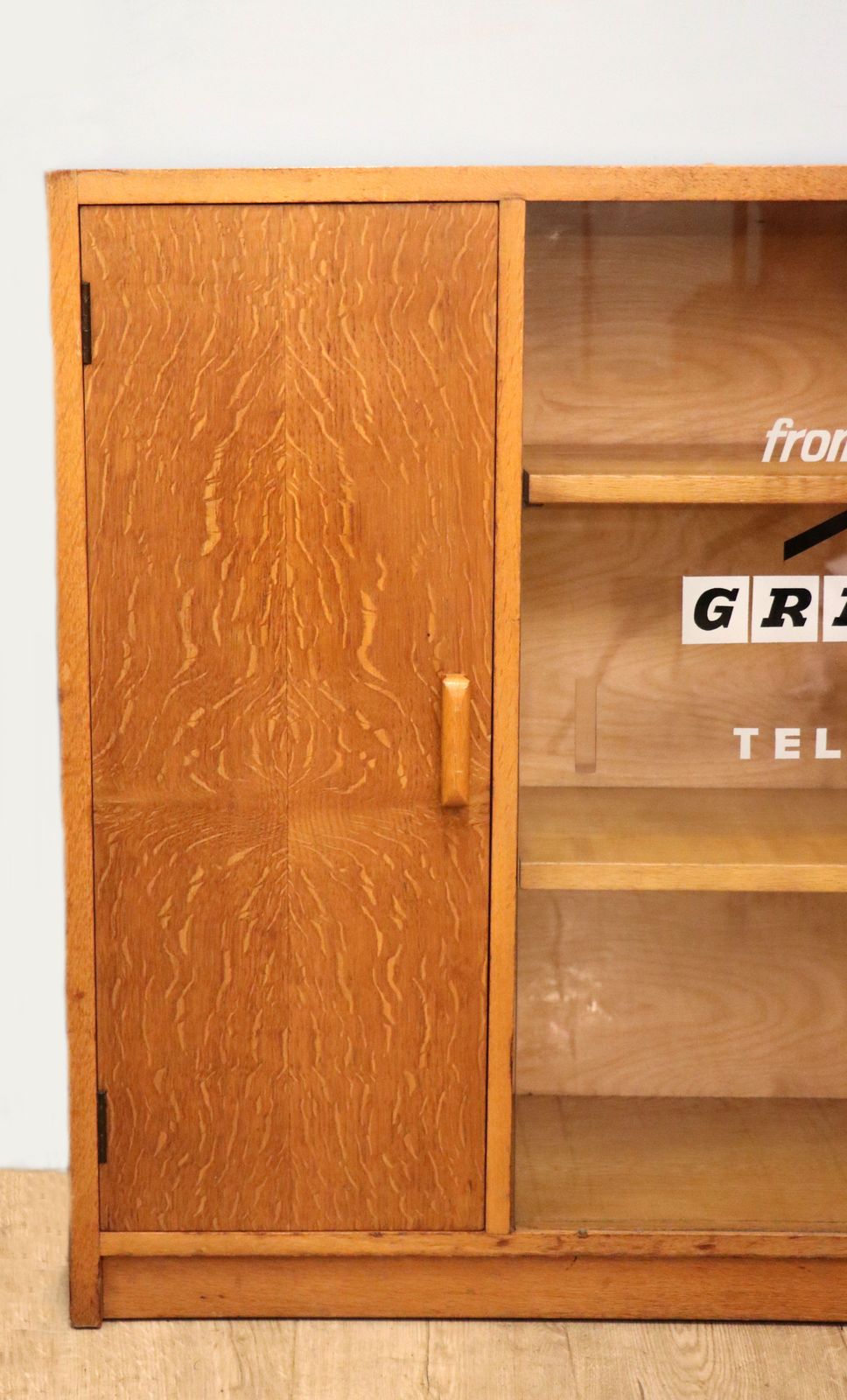A Mid Century Light Oak Veneered Bookcase Later Sign Written For The Granada Television photo vintage