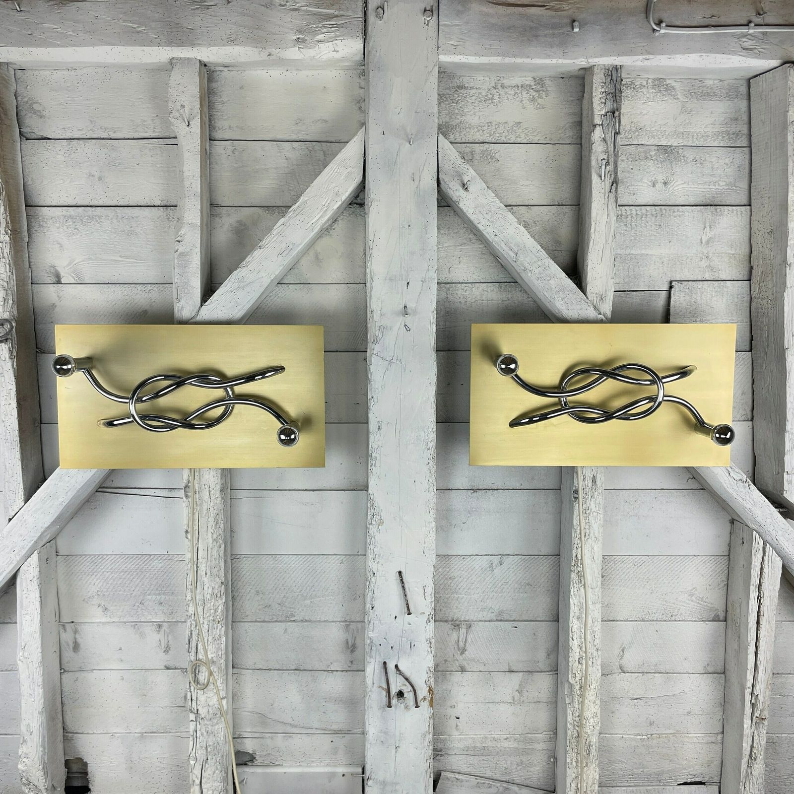 A Pair Of 1970s Mid Century Modern Italian 'Reef Knot' Wall Light Panels / Sconces Designed By Giacomo Benevelli For Missaglia photo for sale