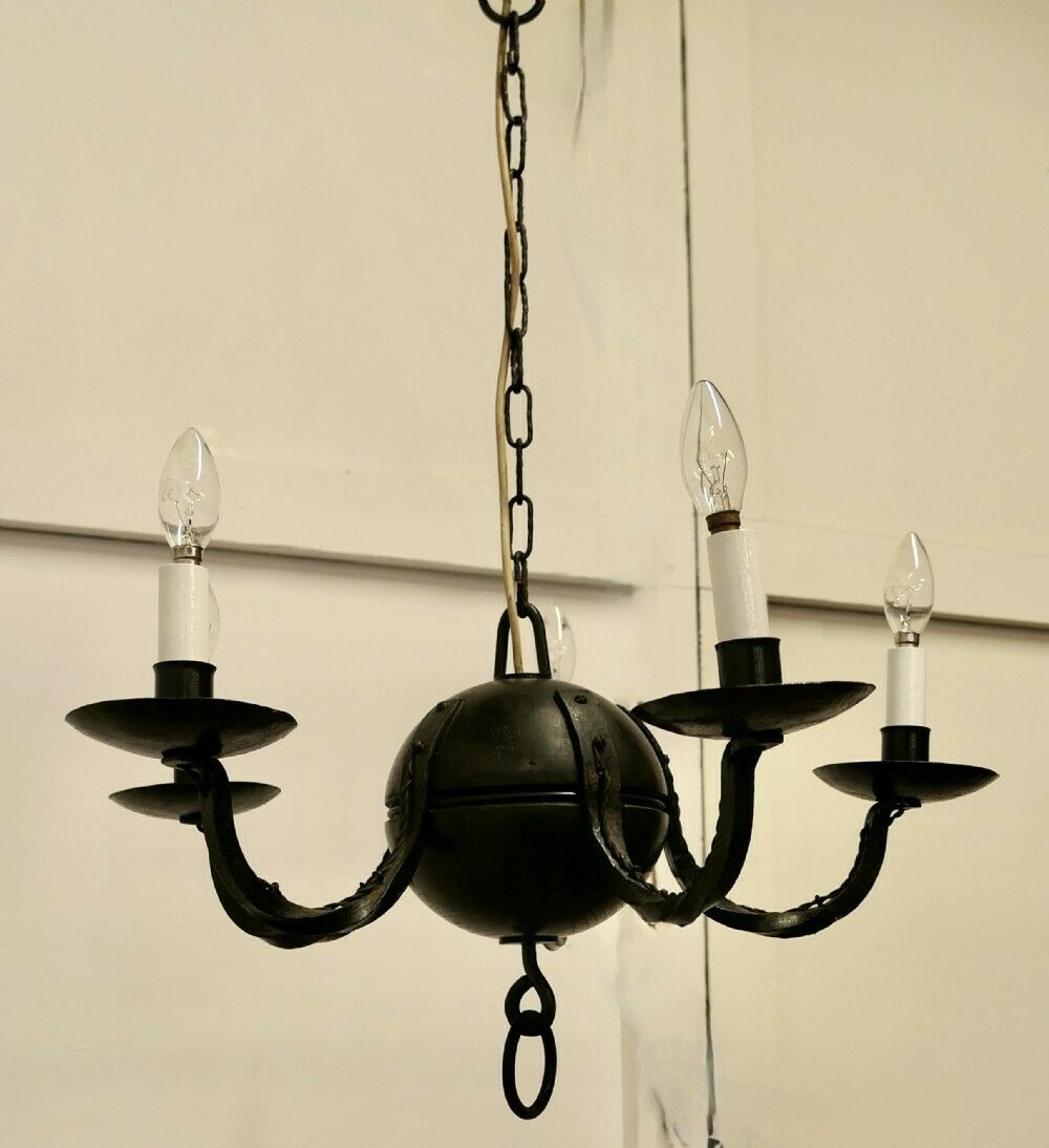 A Superb Gothic Iron And Wood Chandelier photo for sale
