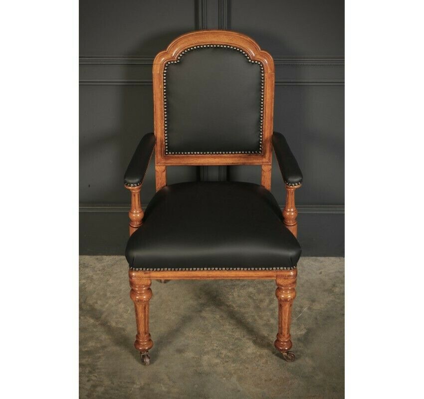 Pair Of Gothic Oak & Leather Chairs By W.Williamson & Sons. photo vintage