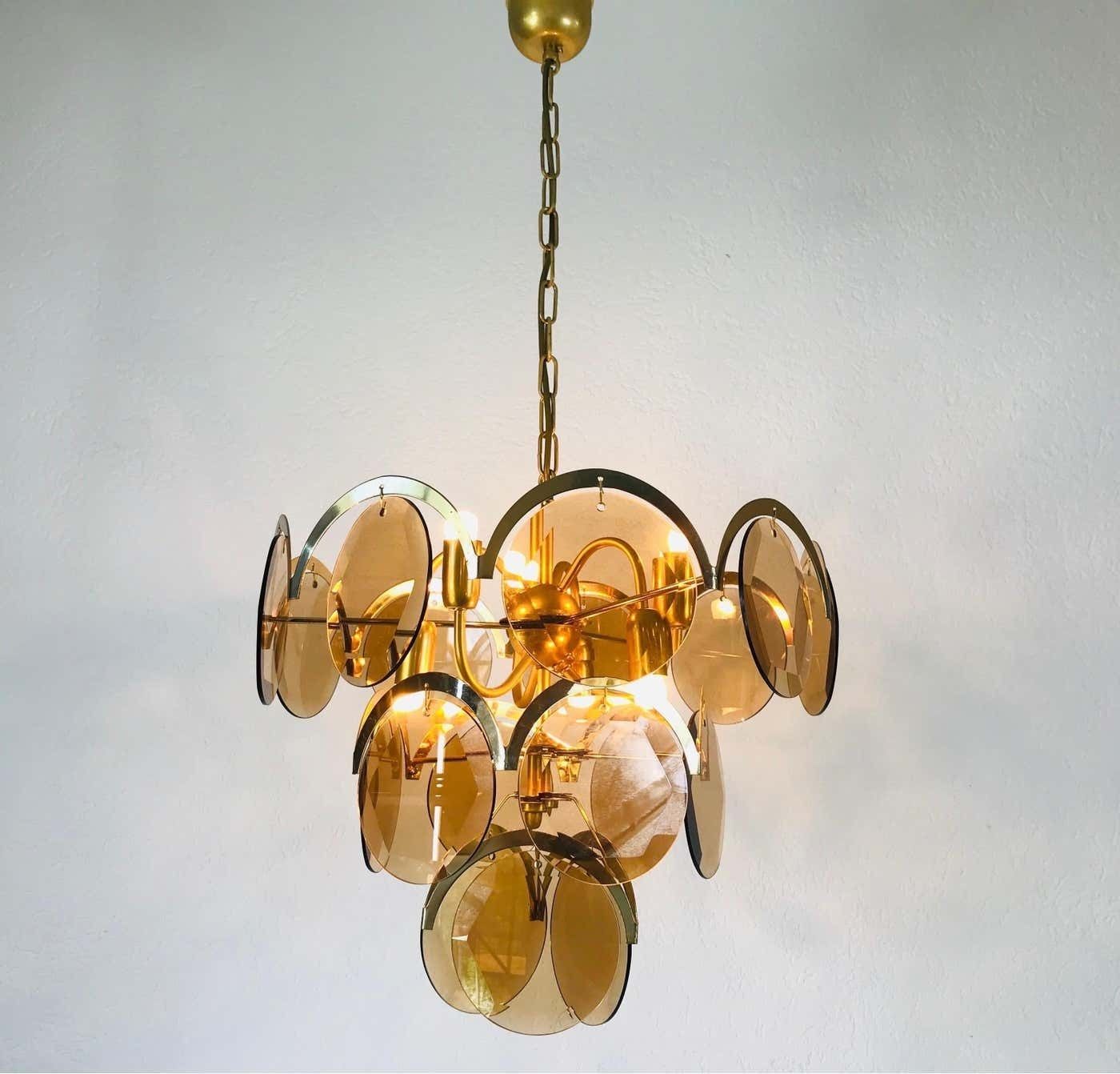Midcentury Three Tier Brass And Glass Chandelier By Vistosi, 1960s photo furniture