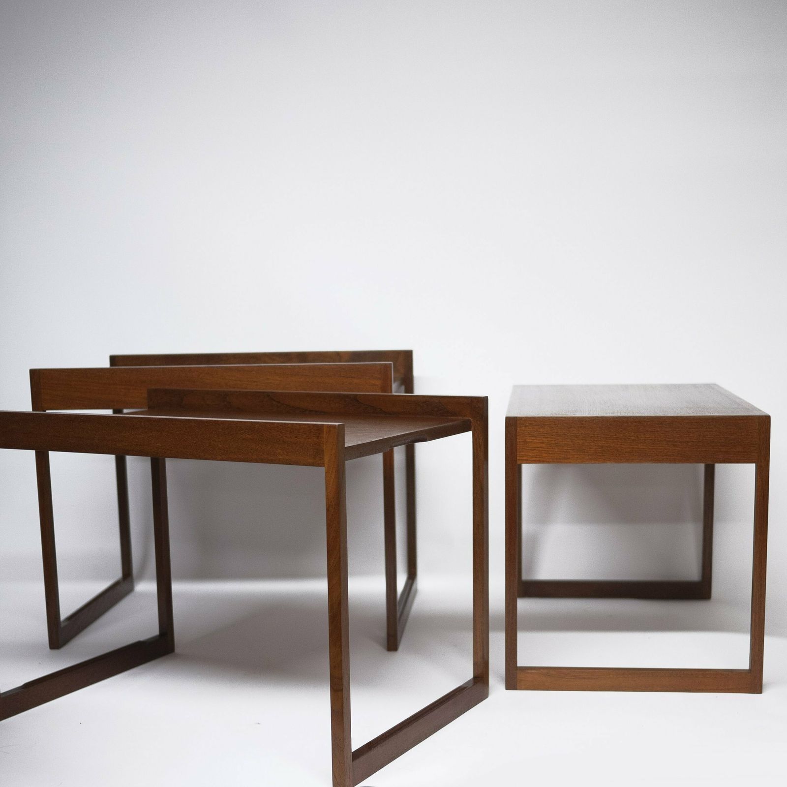 Furniture Danish Teak Stacking Nest Of Tables By Illum Wikkelso For Cfc Silkeborg, 1960s photo