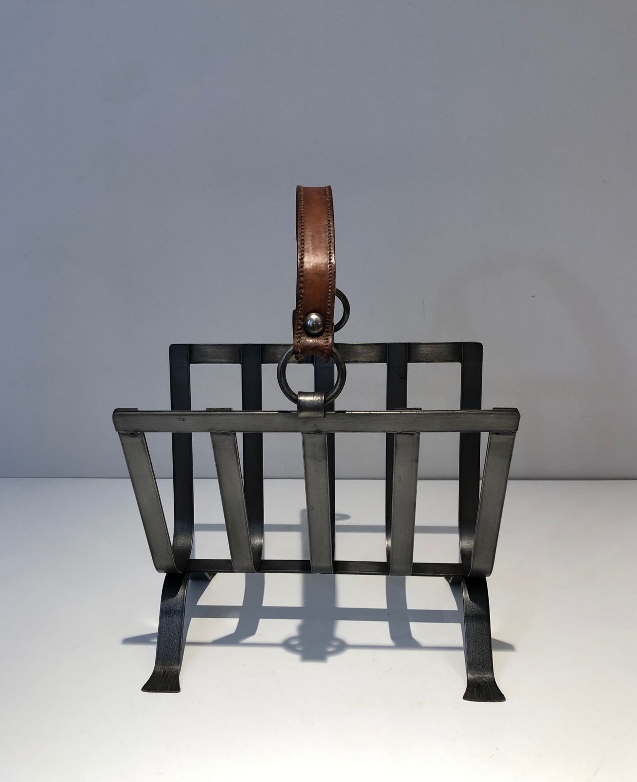 Steel And Leather Magazine Rack photo furniture