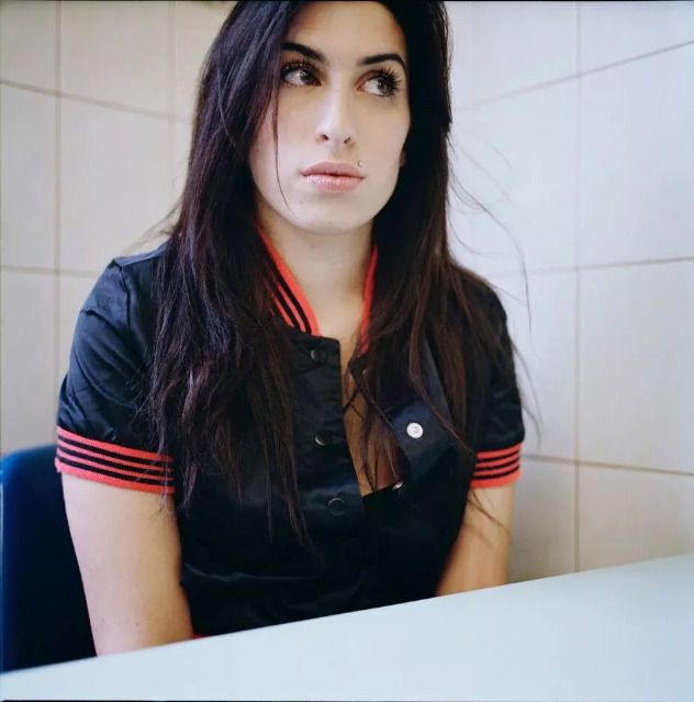 'Amy Winehouse Kentish Town Close Up' Jake Chessum Framed In Black photo furniture