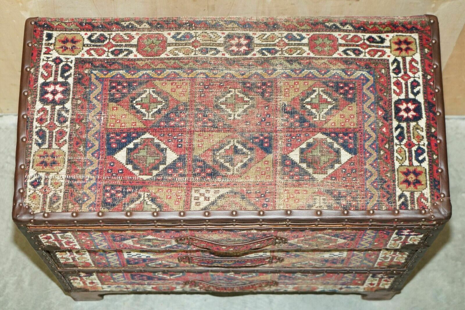 photo vinterior Vintage Kilim & Brown Leather Chest Of Drawers Finished With Antique Pin Nails