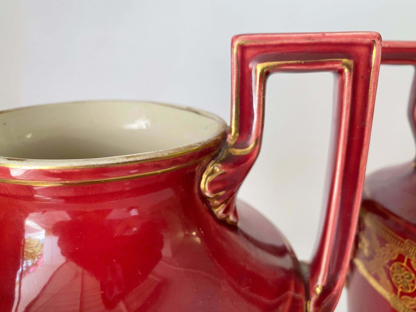 photo for sale Pair Of Red Cobalt Urns Vase With Ceramic Handles And Gilted Decorations
