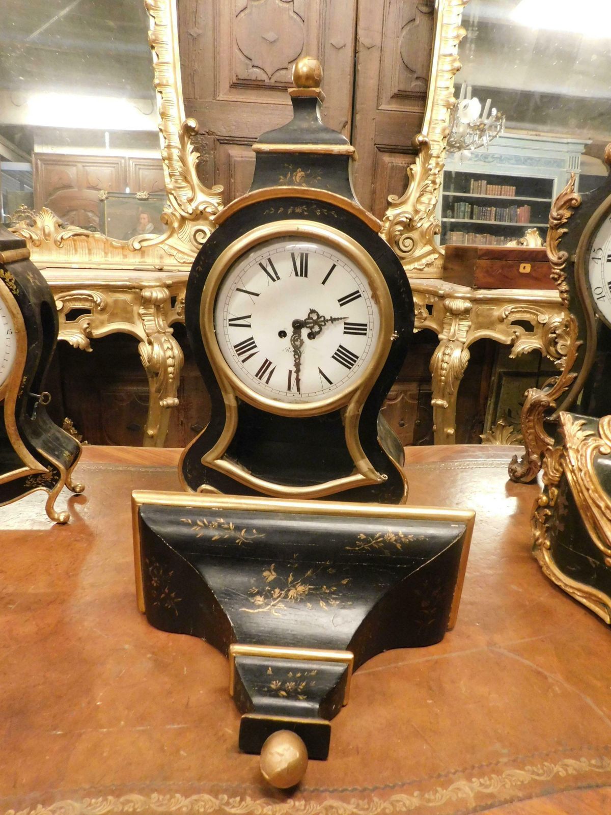 photo furniture Set N.3 Clocks Ebonised Wood, Profiles And Feet Decorated Gilded Plant Motifs