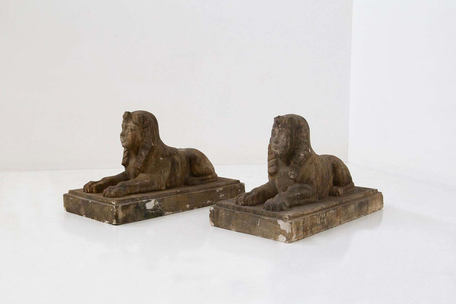 Pair Of Egyptian Sphinxes In Gold Coloured Scaiola Plaster photo furniture