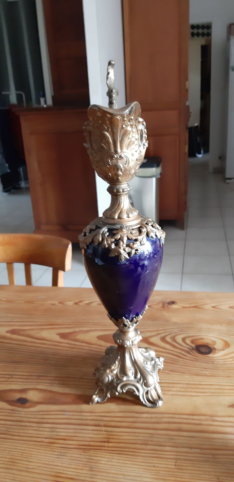 photo for sale Pair Of Golden Spelter And Blue Glass Ewers