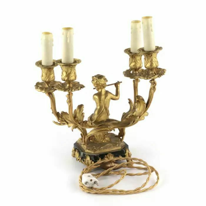 photo furniture Paired Lamps Of Gilded Bronze With Cupids Playing Music