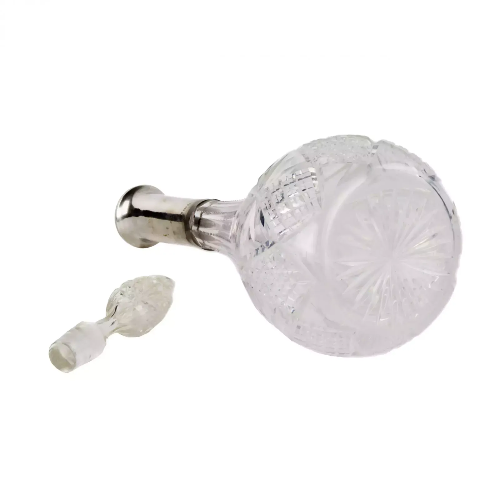 Crystal Decanter With A Silver Neck. photo Home Decor