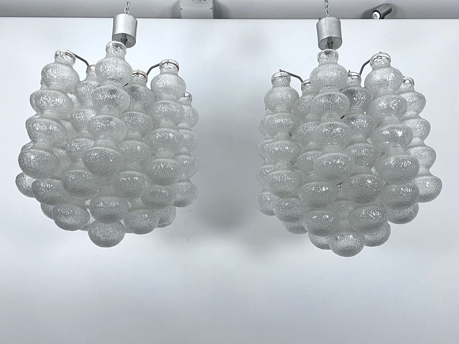 photo for sale Pair Of Mid Century Murano Bubble Glass Chandeliers. Italy 1960s
