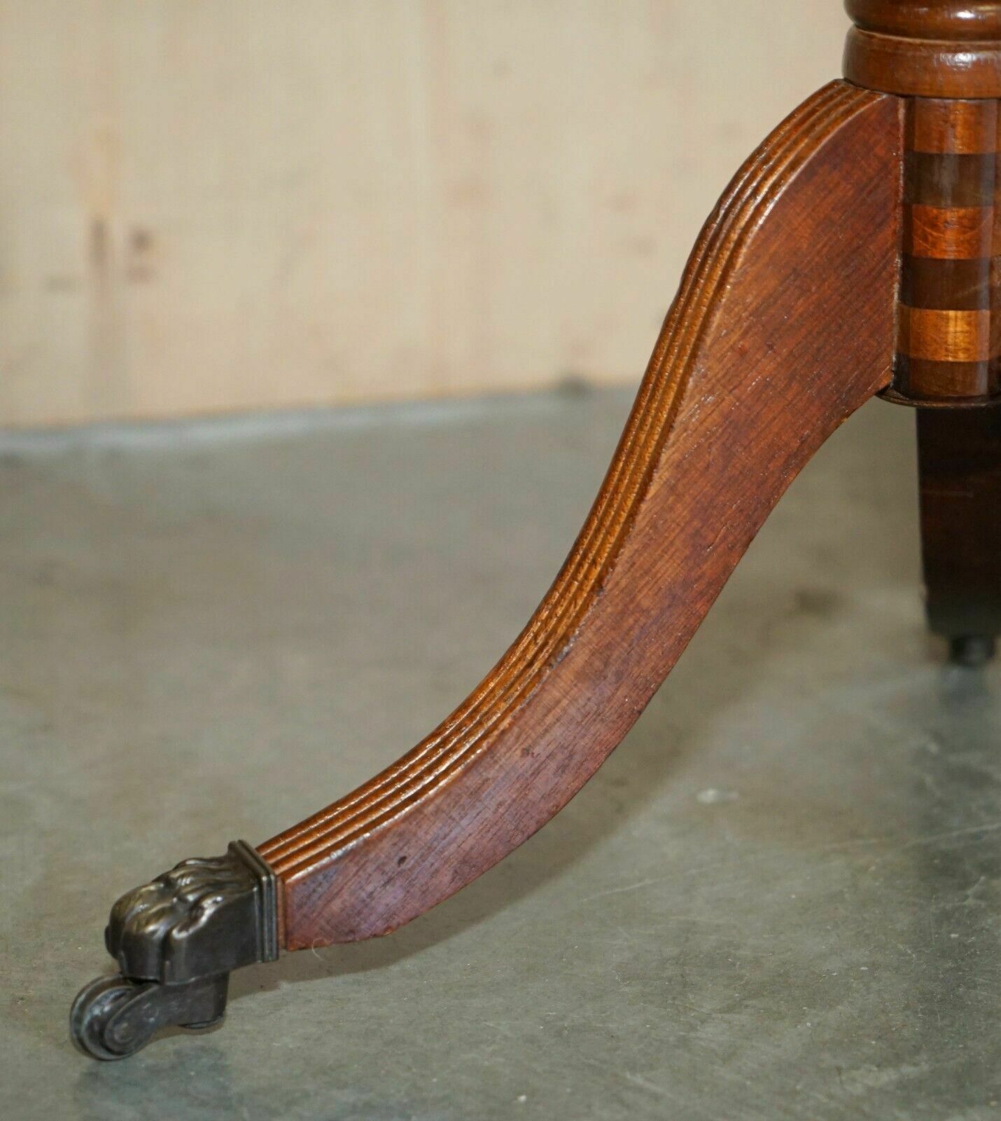 photo for sale Vintage Hand Dyed And Aged Brown Leather Oval Coffee Table With Lion Castors