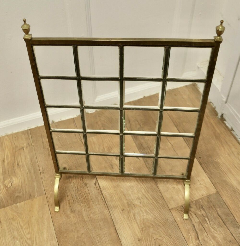 A Victorian Brass And Glass Art Nouveau Fire Screen photo furniture