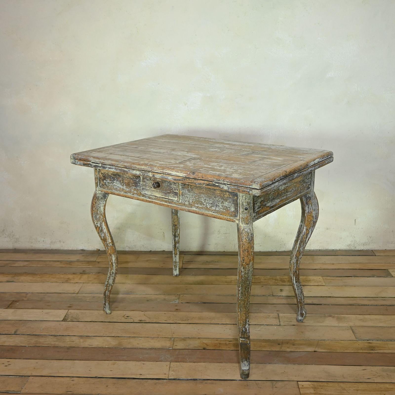 A 19th Century French Painted Swivel Top Dining Table photo buy